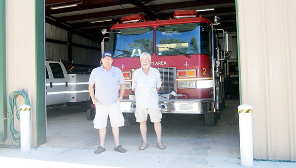 Gantt Fire Chief Scott Fight and Kelley Carter stand outside of the new fire station.  Kendra Majors/Star-News