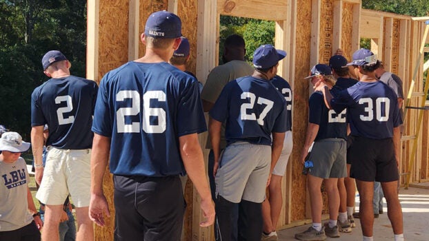 LBW baseball team helps with new Habitat House