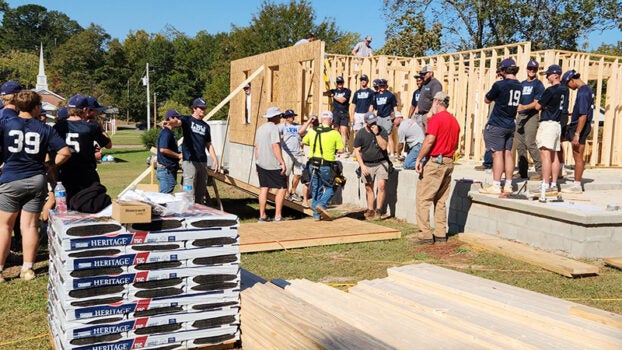 LBW baseball team helps with new Habitat House